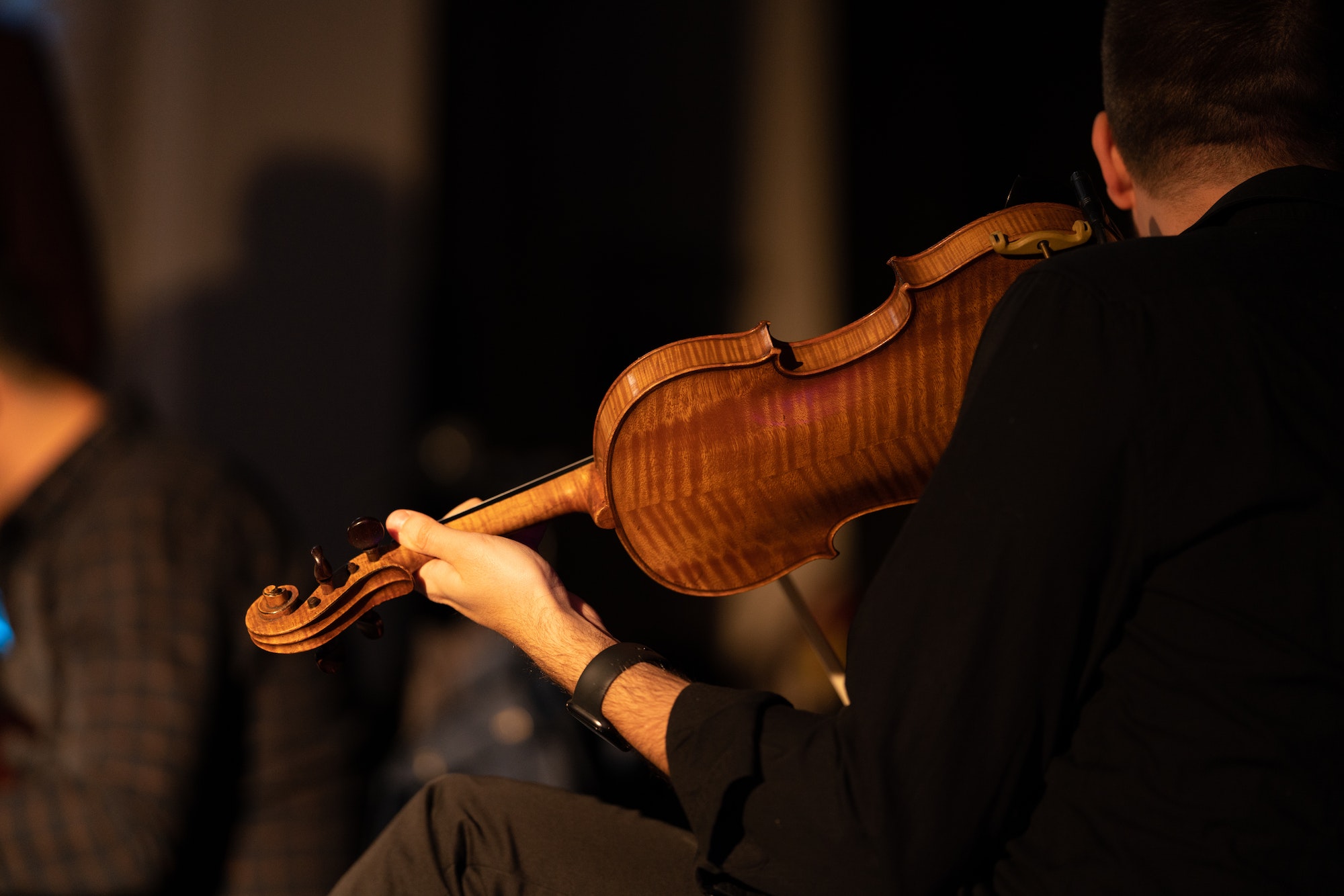 The man plays the violin Los Violines de Marquito